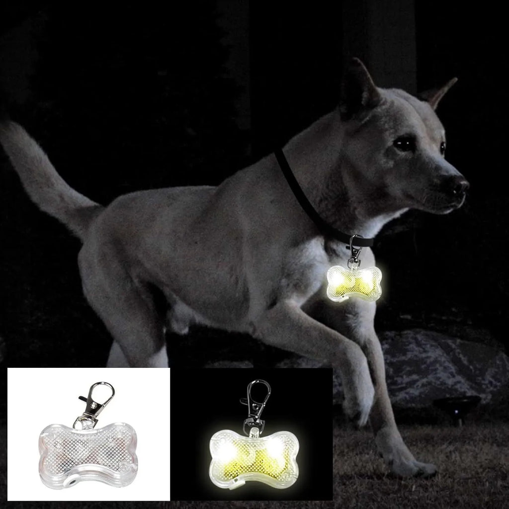 Plastic bone-shaped LED light pendant for attaching to a pet dog or cat collar.