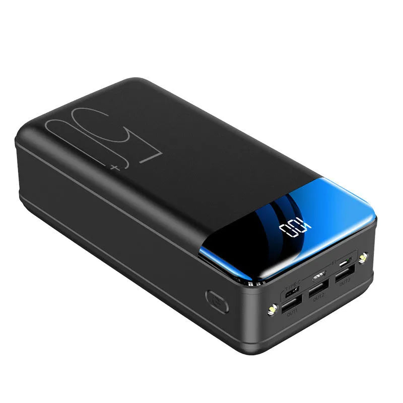 Large 50000mAh power bank with three USB ports in black or white plastic case