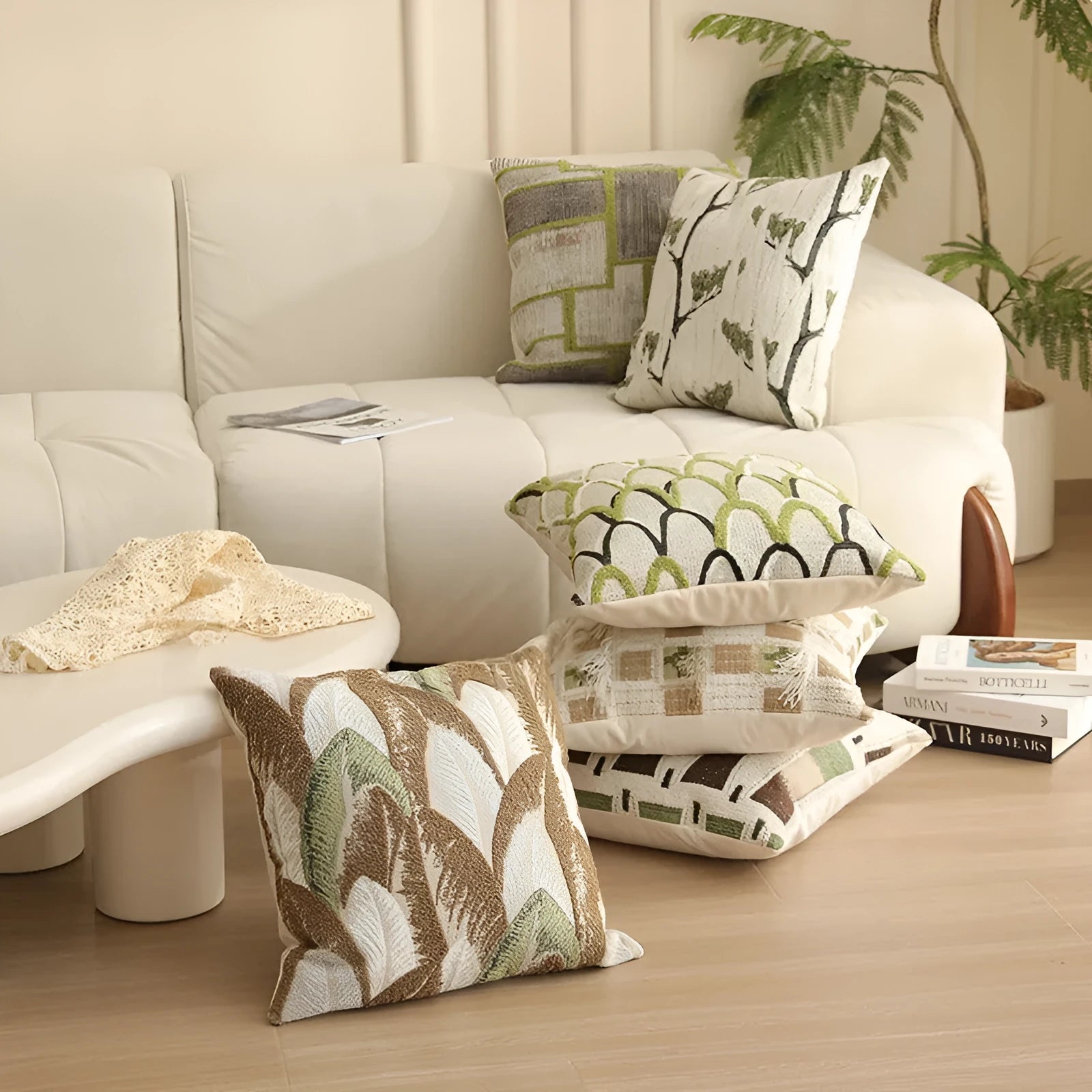 Square jacquard pillow with botanical floral pattern, shown in one of eight available colour options.