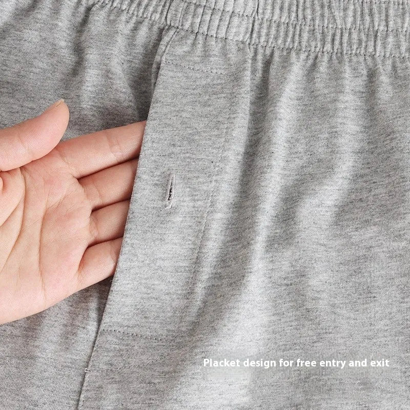 Men's cotton boxer shorts in light grey, dark blue and black colours showing high waist loose fit design