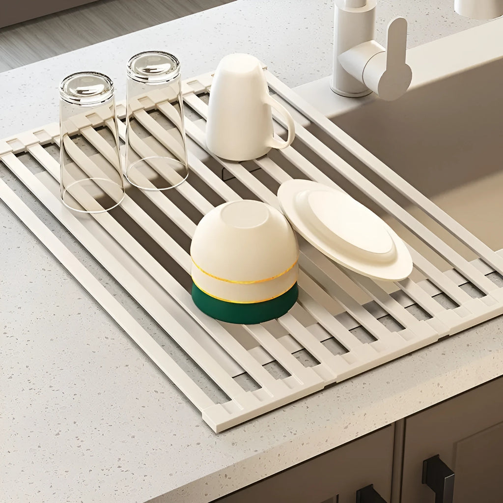 Milky white stainless steel foldable kitchen draining rack with tri-fold design on sink