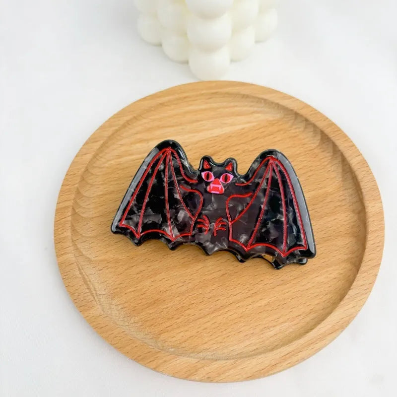 Halloween hair clip with hand-made shark and bat vinegar fabric design in four colour options