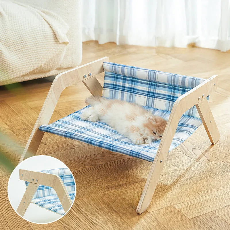 Wooden elevated cat bed hammock with soft cloth cushion in blue colour for indoor cats