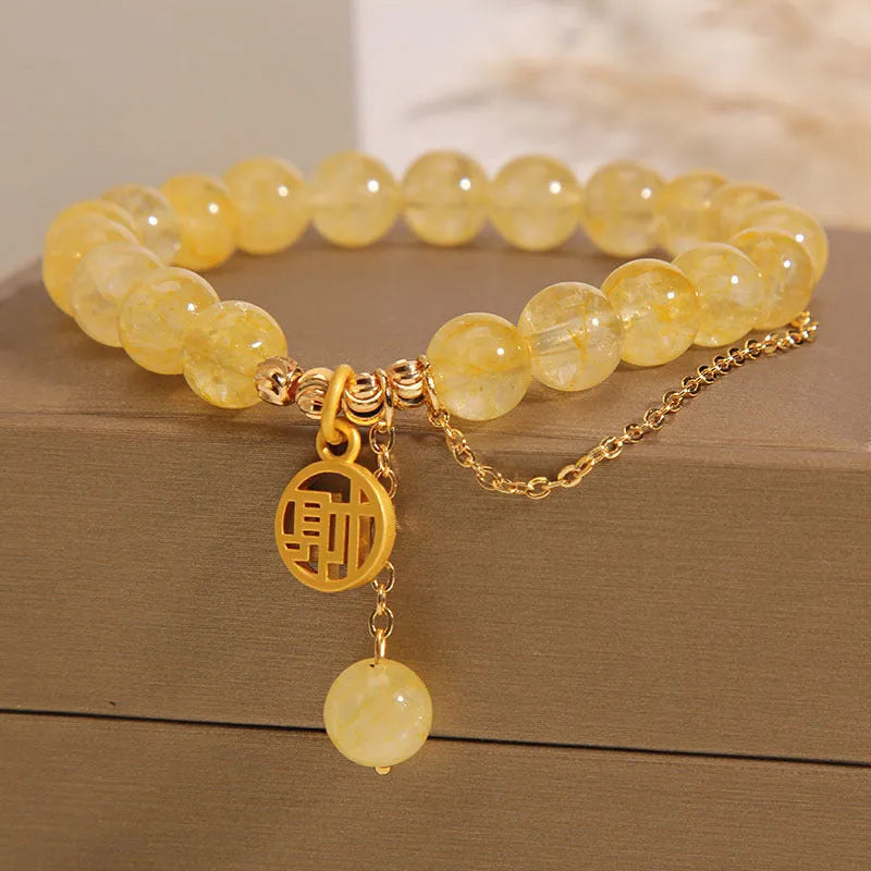 Citrine stone bracelet with Chinese character tassel in mixed materials