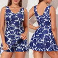 Printed backless one-piece swimsuit with V-neck, high waist, and sleeveless cut in blue pattern