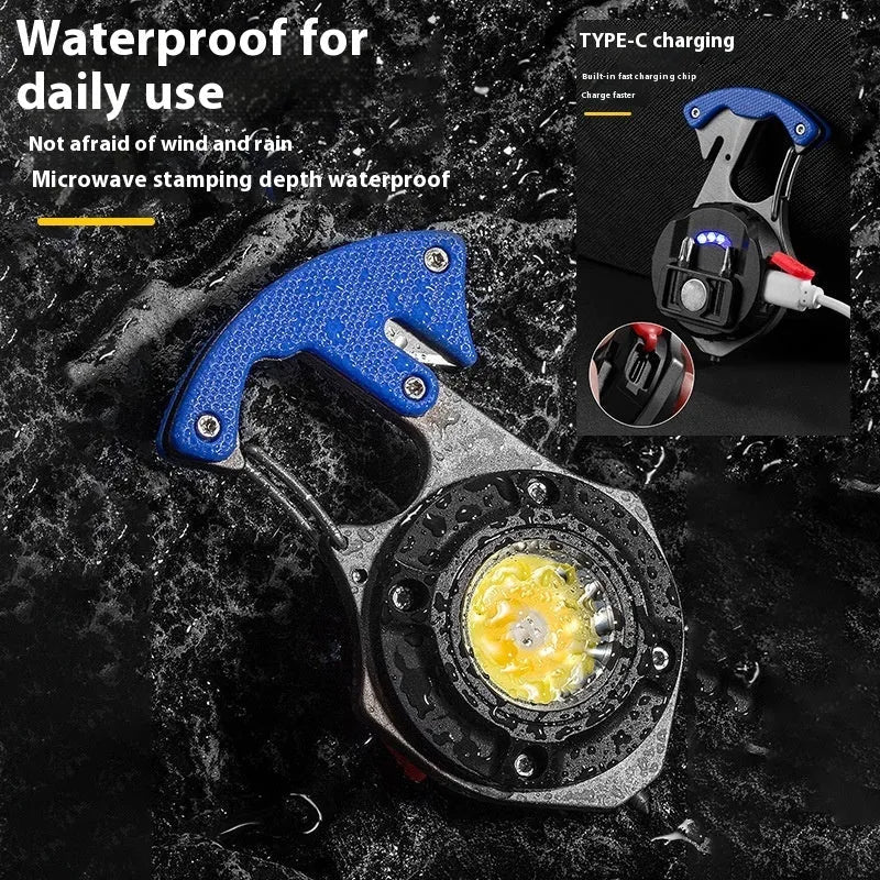 Compact silver and black multifunctional keychain flashlight with a window-breaking hammer tip and screwdriver.