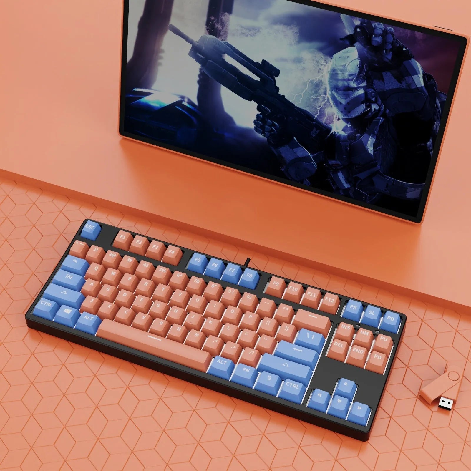 87 key wired mechanical keyboard with metal chassis shown in a black, orange, and yellow colour configuration.