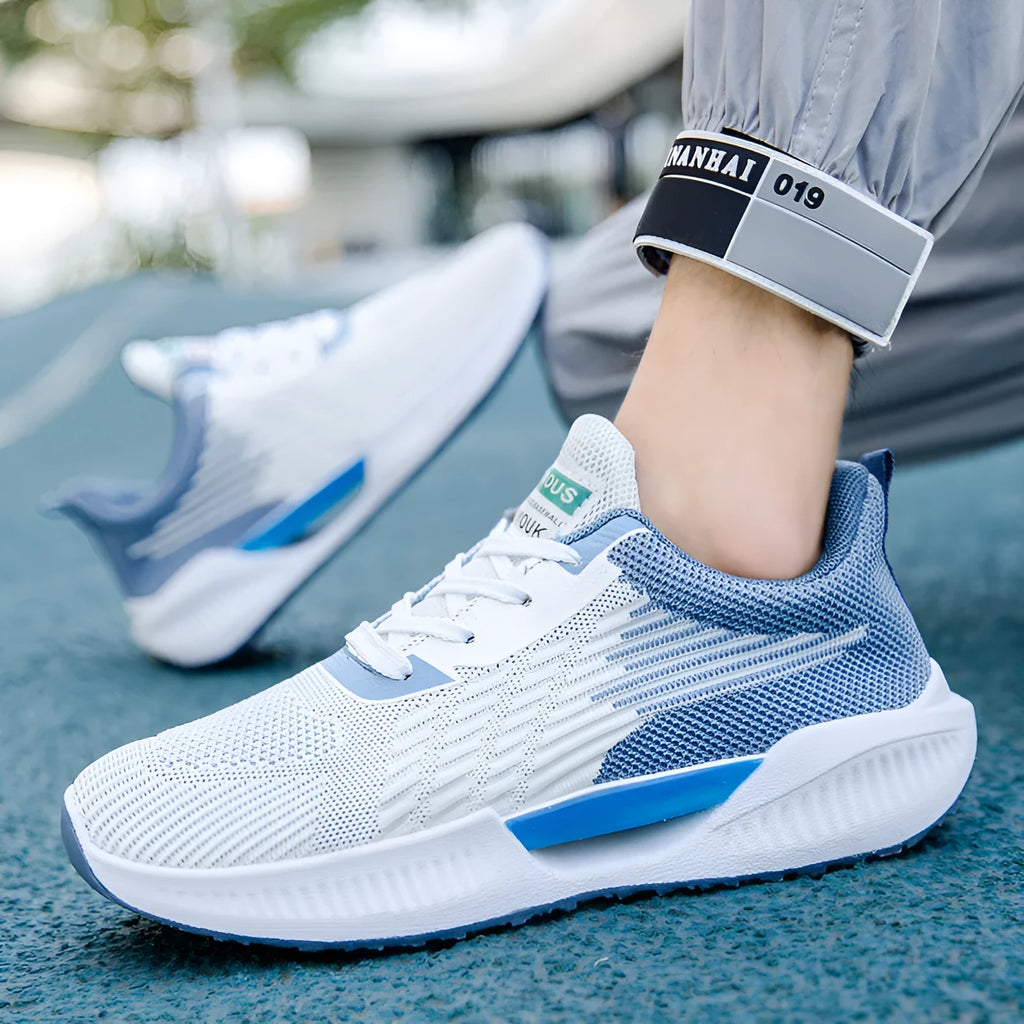 Men's breathable mesh sports shoes with injection moulded sole in blue gray and green colors
