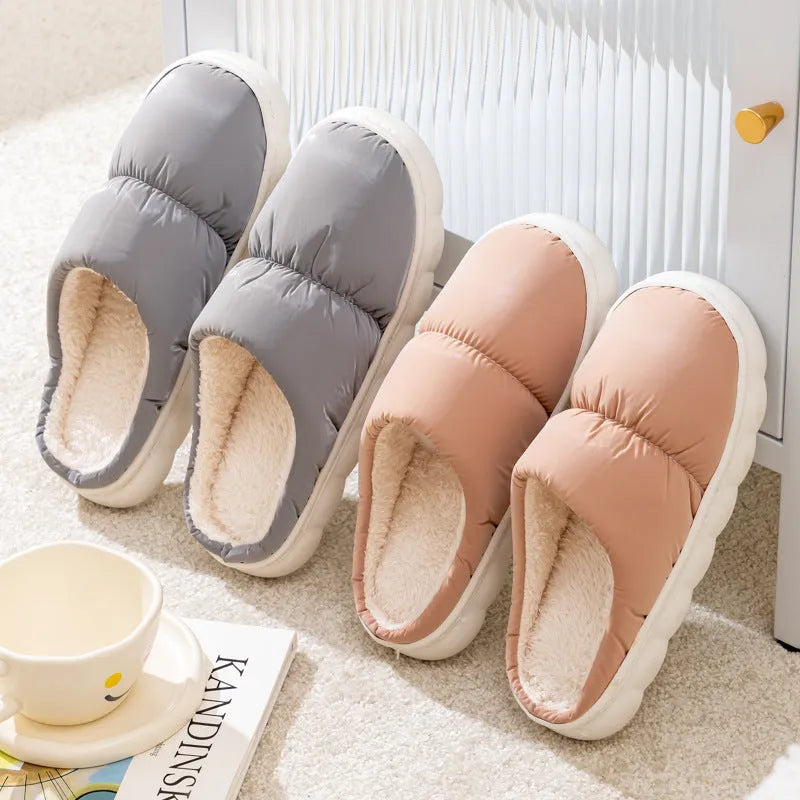 Blue couple's winter slippers with artificial leather upper, plush lining, and thick rubber anti-slip sole.