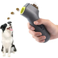 Grey pet snack catapult launcher toy on a table showing its size and spring trigger.