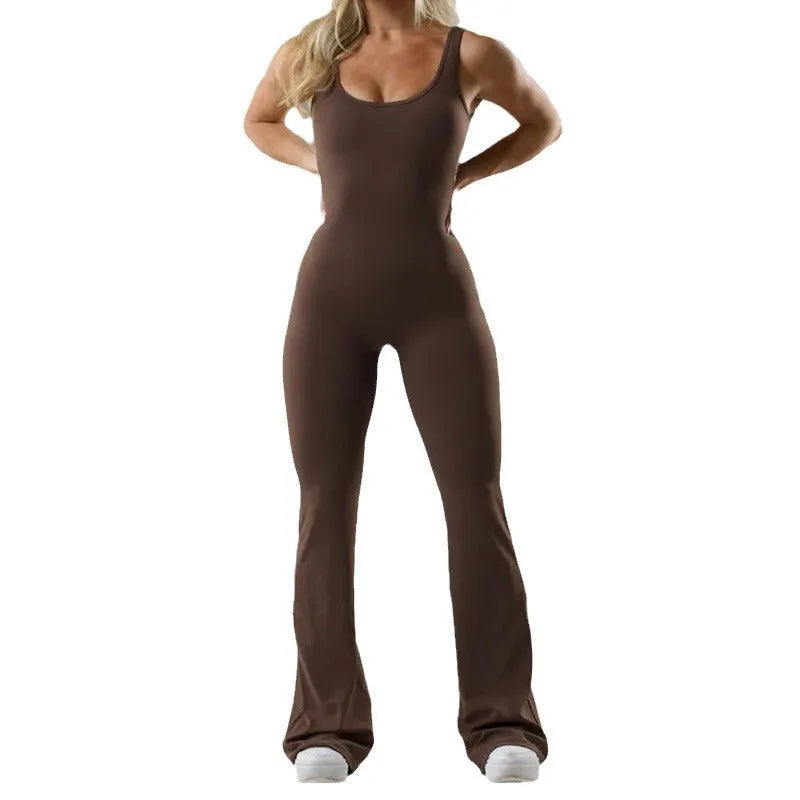 Women's black milk silk seamless yoga bodysuit with hollow design and mid waist.
