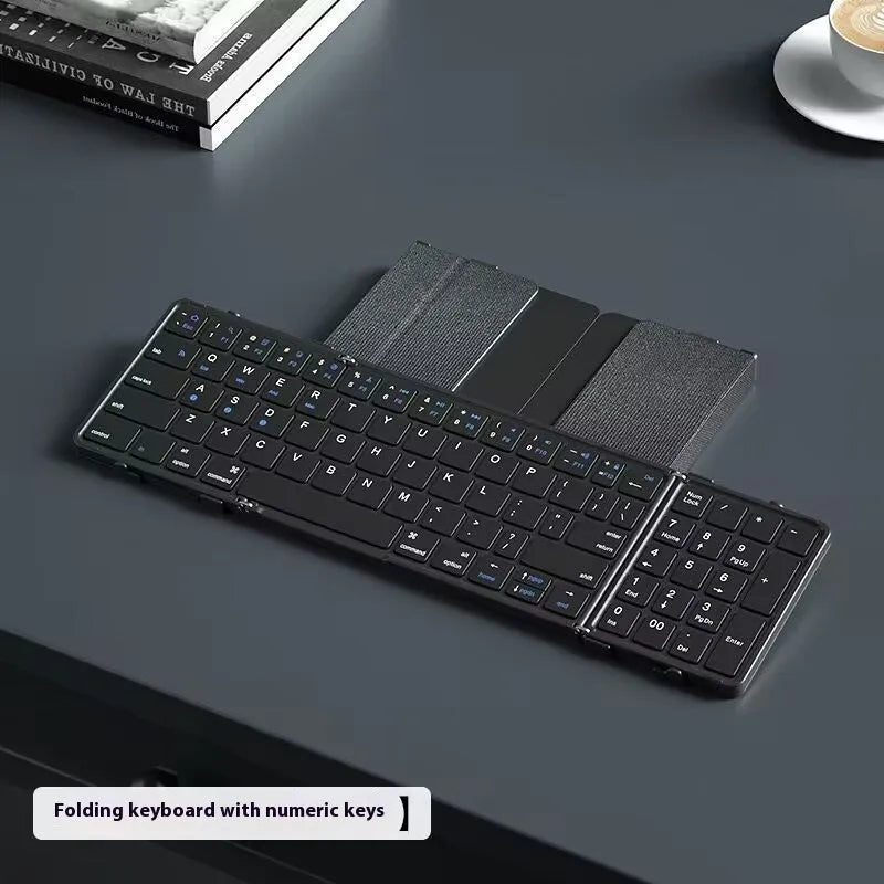 Black folding Bluetooth keyboard with either touchpad or digital board accessory for mobile phones and tablets