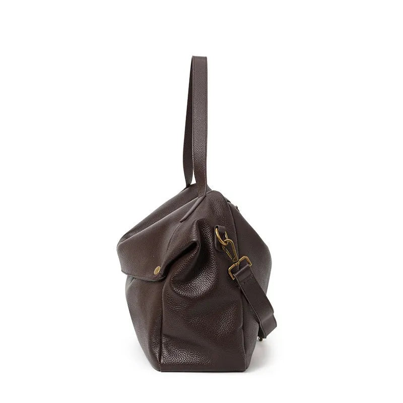 Brown genuine leather women's commuter shoulder bag with horizontal square design and zippered interior compartment