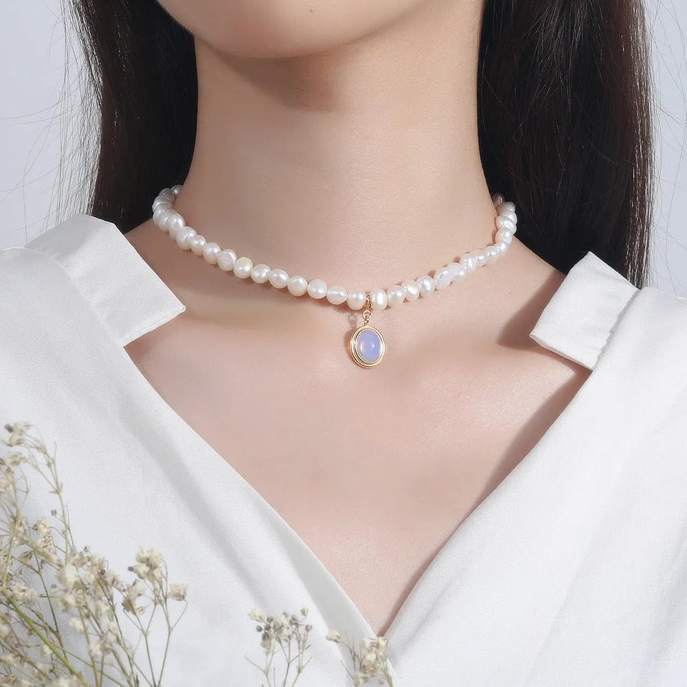 Geometric round medal pearl necklace with irregular freshwater pearls on adjustable silver chain