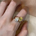 Water drop double Sheng stone copper ring with geometric open design and zircon detailing