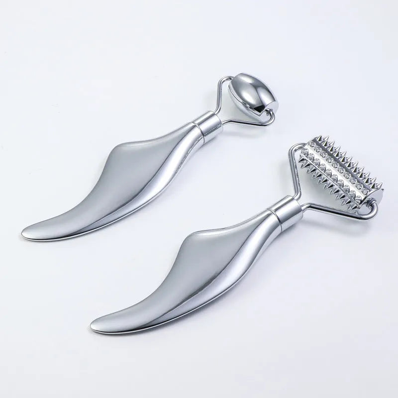 Stainless steel double-headed facial roller and heart-shaped eye massage stick with scraping plate.