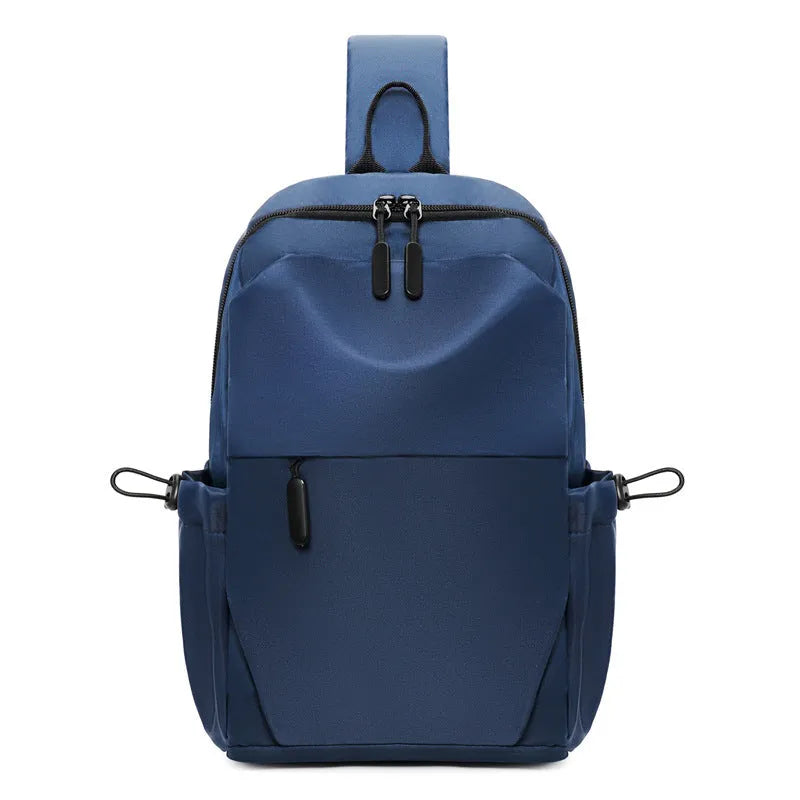 Men's grey waterproof chest bag showing front compartment with 33cm height measurement