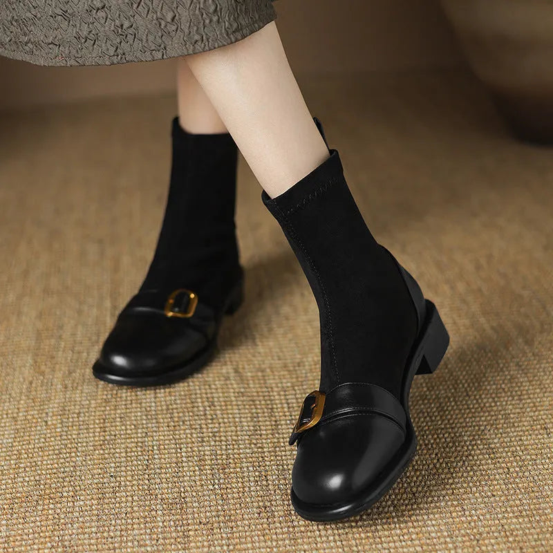 Women's black casual ankle boots with lace-up front and low rubber heel