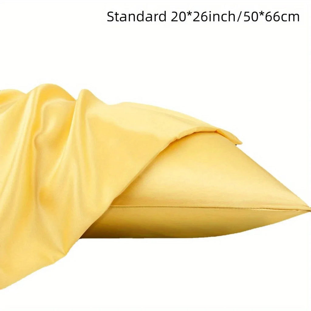 A pair of solid-colour satin pillowcases in polyester fibre, shown in one of thirteen available colours.