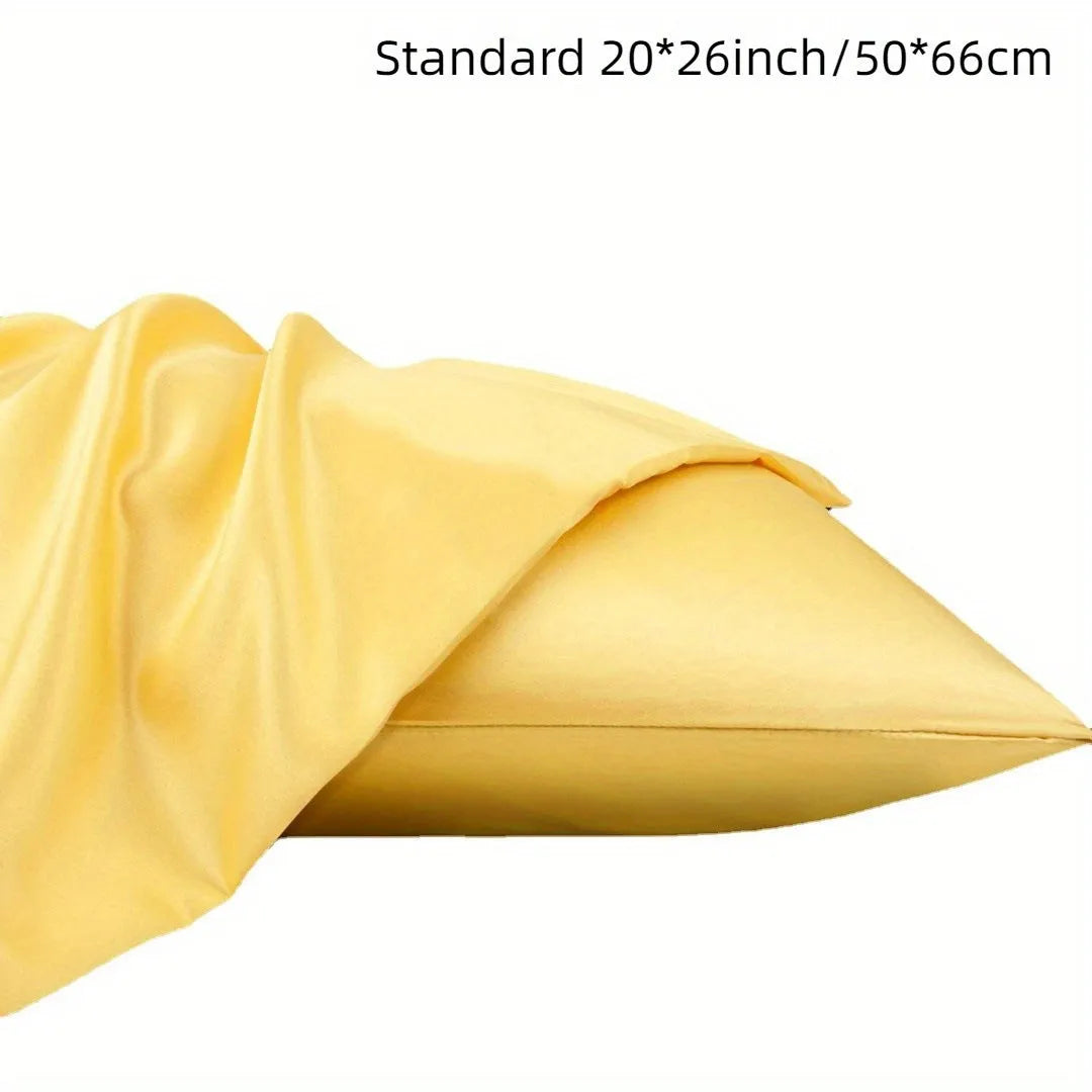 A pair of solid-colour satin pillowcases in polyester fibre, shown in one of thirteen available colours.