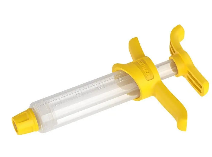 EZmtb bicycle hydraulic disc brake bleed kit with syringes, bottles, wrenches, and adapters on a workbench