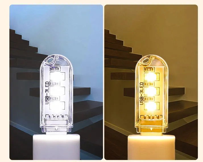 Small white USB LED baby night light showing warm and white light colour options.