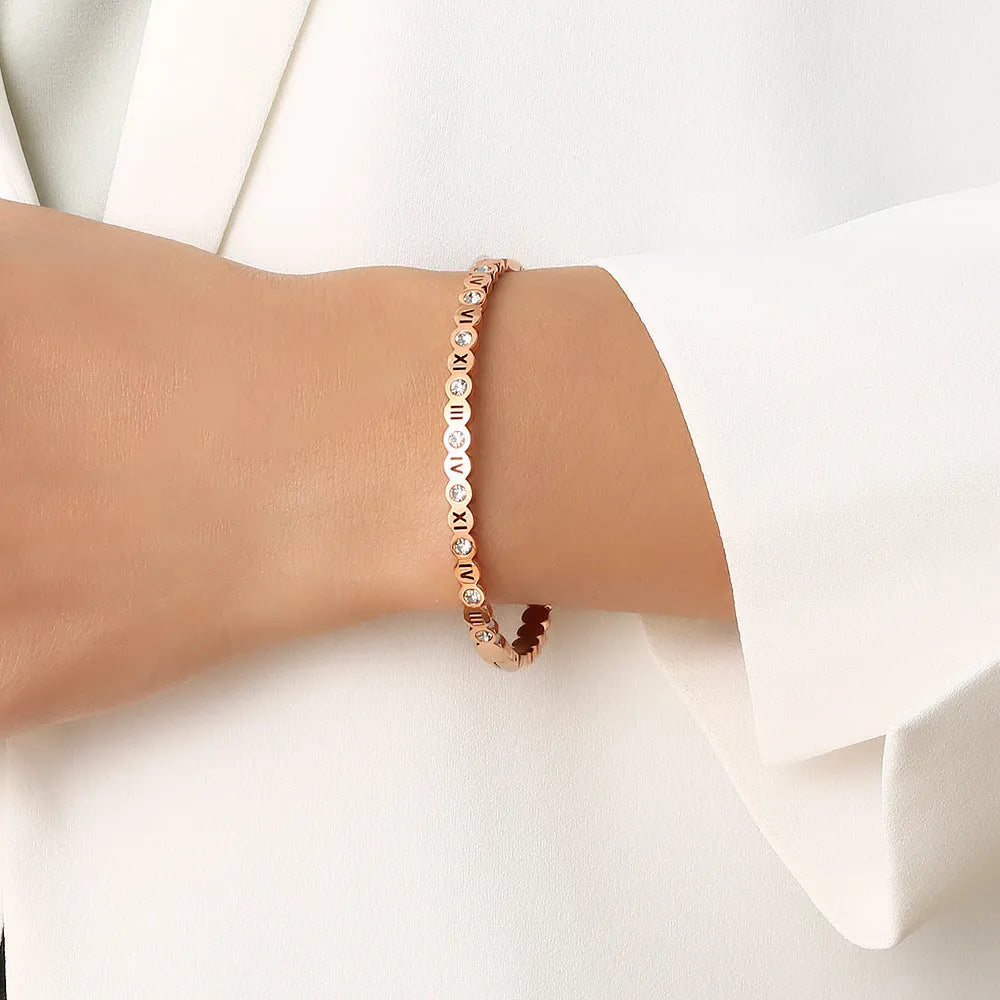 Korean style titanium steel bracelet with number elements in gold, rose gold or steel colour
