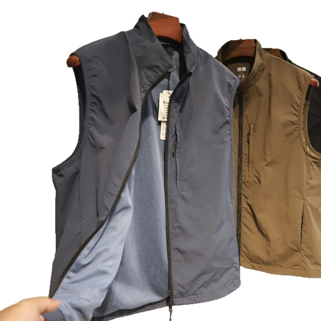 Men's straight-cut nylon vest in Army Green with side seam pockets.