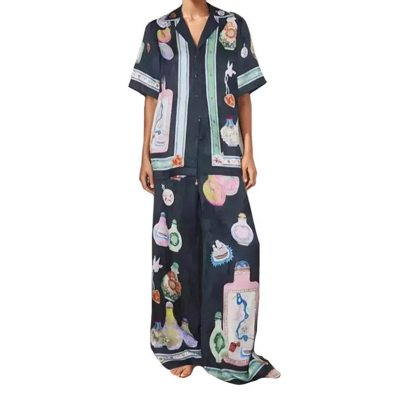 Black two-piece cardigan and pants set with cartoon animation pattern for women