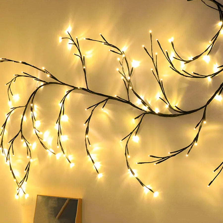 Flexible LED vine light garland with birch bark texture and warm white LEDs bent into decorative shape