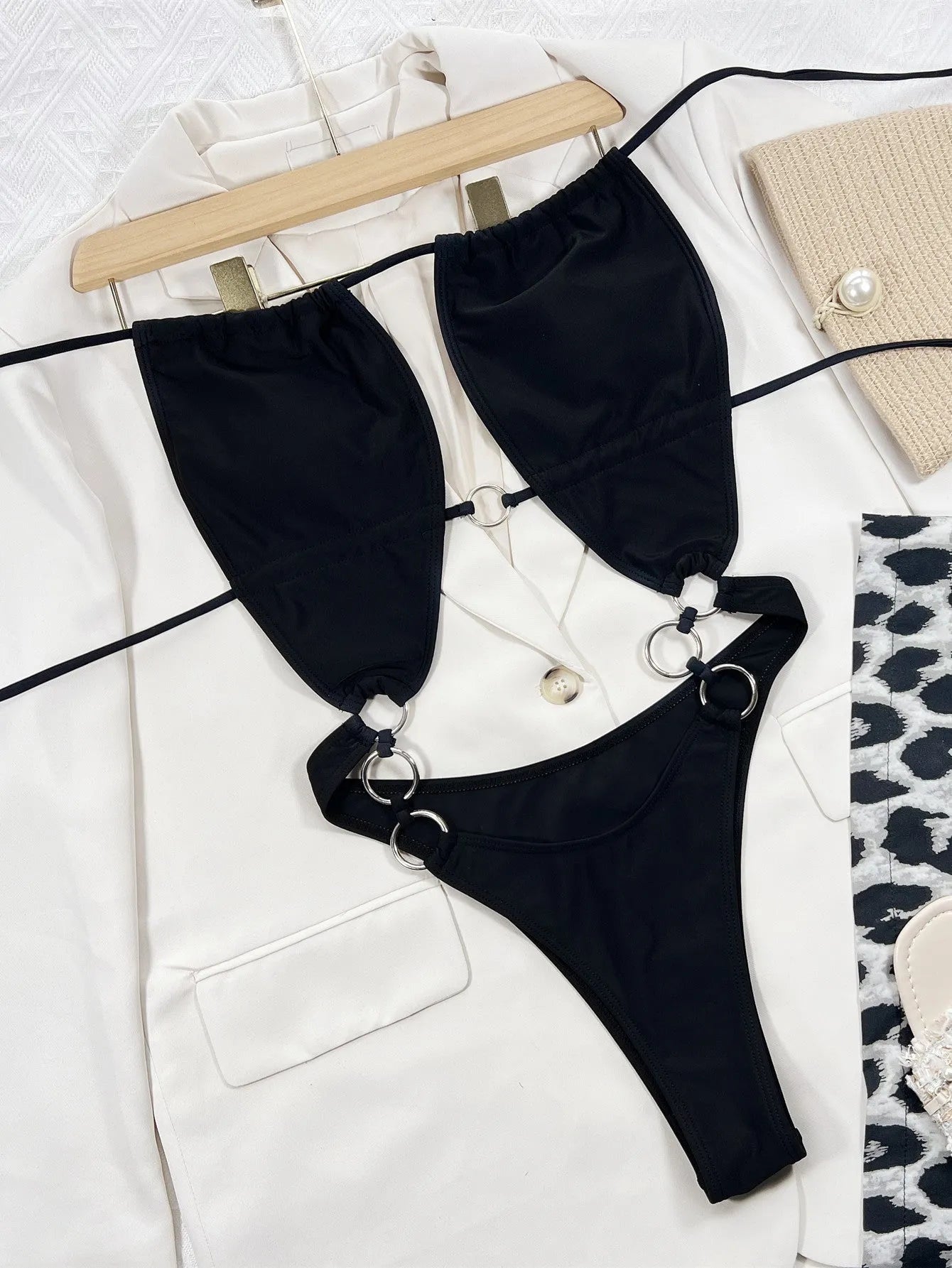 Black sleeveless one-piece swimsuit for women in solid colour design