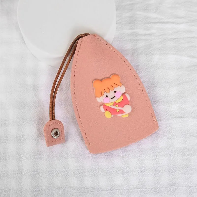 Colourful cartoon pull-out key case made from PU leather, showing the key extended from its protective sleeve.