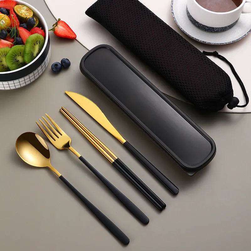 Four-piece stainless steel cutlery set with knife, fork, spoon and teaspoon in a mesh bag, gold and silver colour options