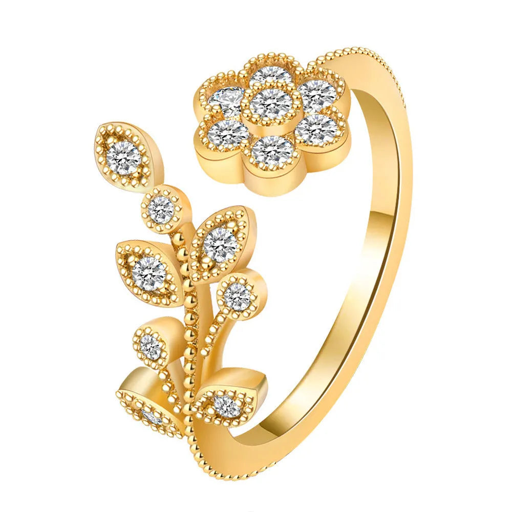 Women's open ring with diamond treatment flower leaves design in gold or white colour