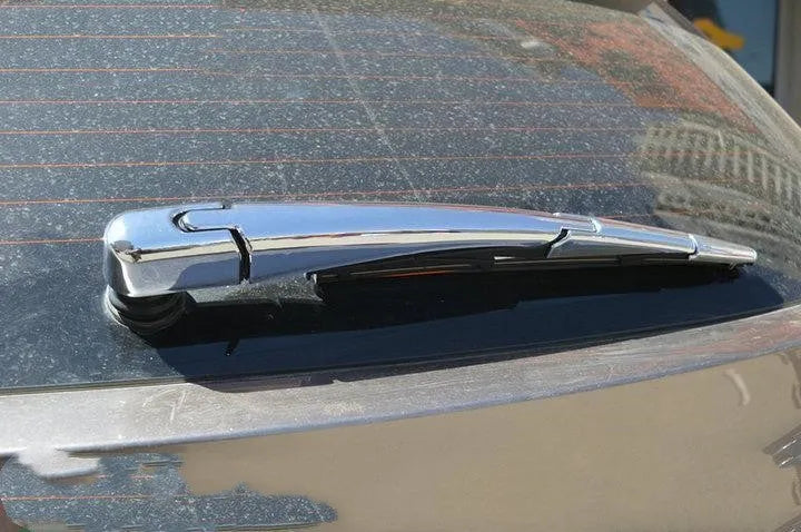 Set of four silvery ABS plastic rear window wiper cover trim strips for a 2010 Hyundai.