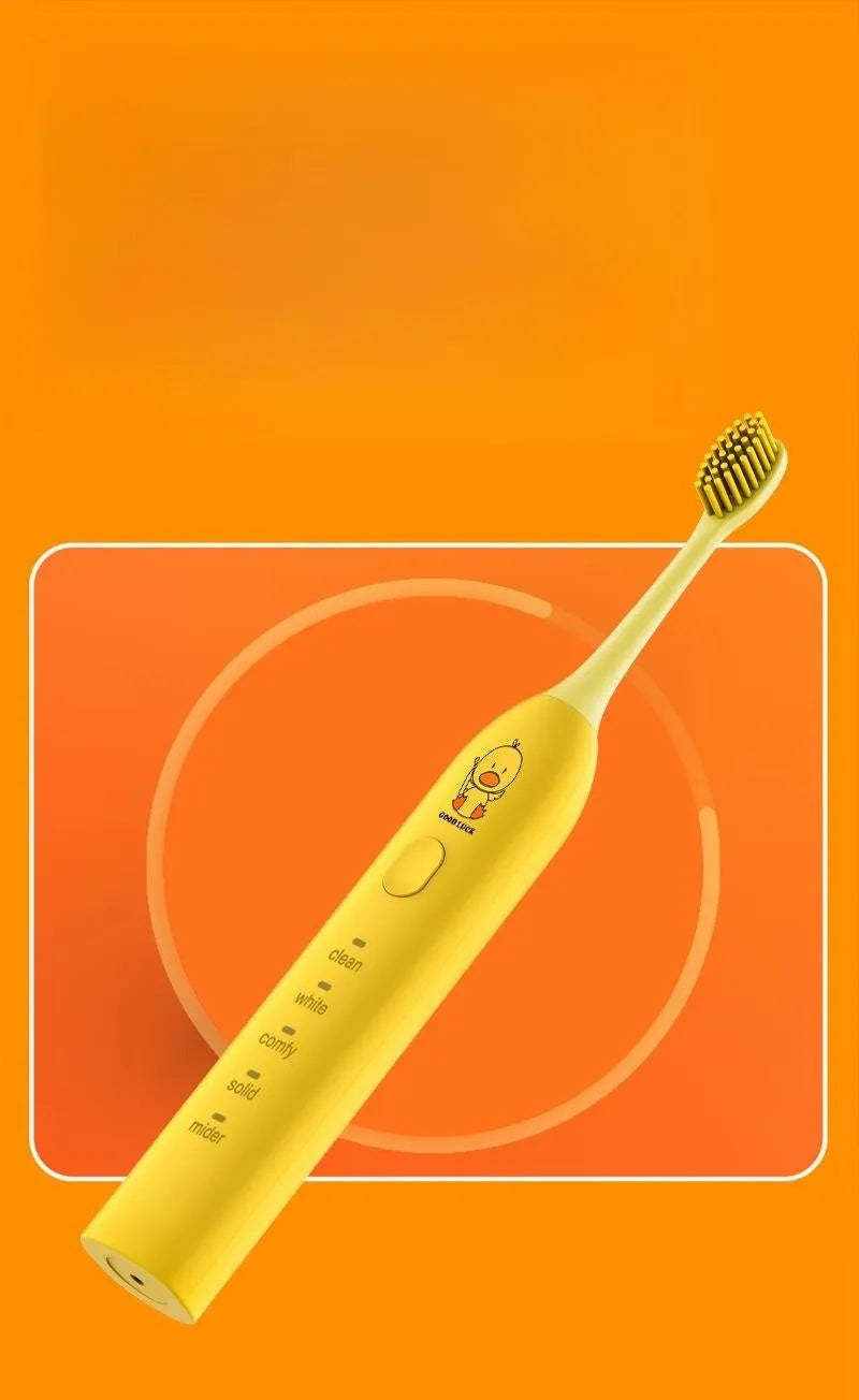 Yellow duck design USB rechargeable electric toothbrush with soft bristles on a bathroom counter.