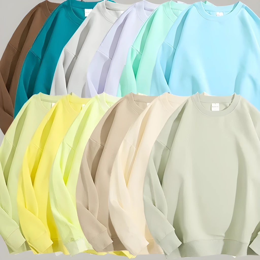 Women's loose fit off-the-shoulder cotton sweater in a solid colour, showing round neck and long sleeves.