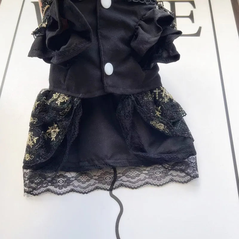 Golden gothic princess costume dress for a small dog or cat on a hanger.