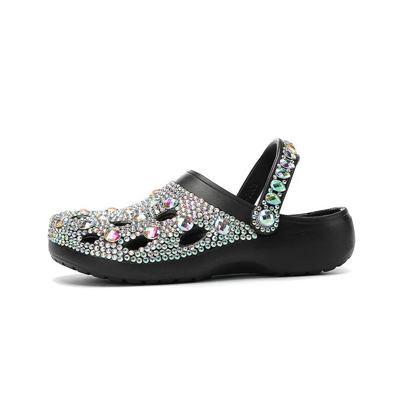 Black women's platform sandals with rhinestone detail on EVA upper.