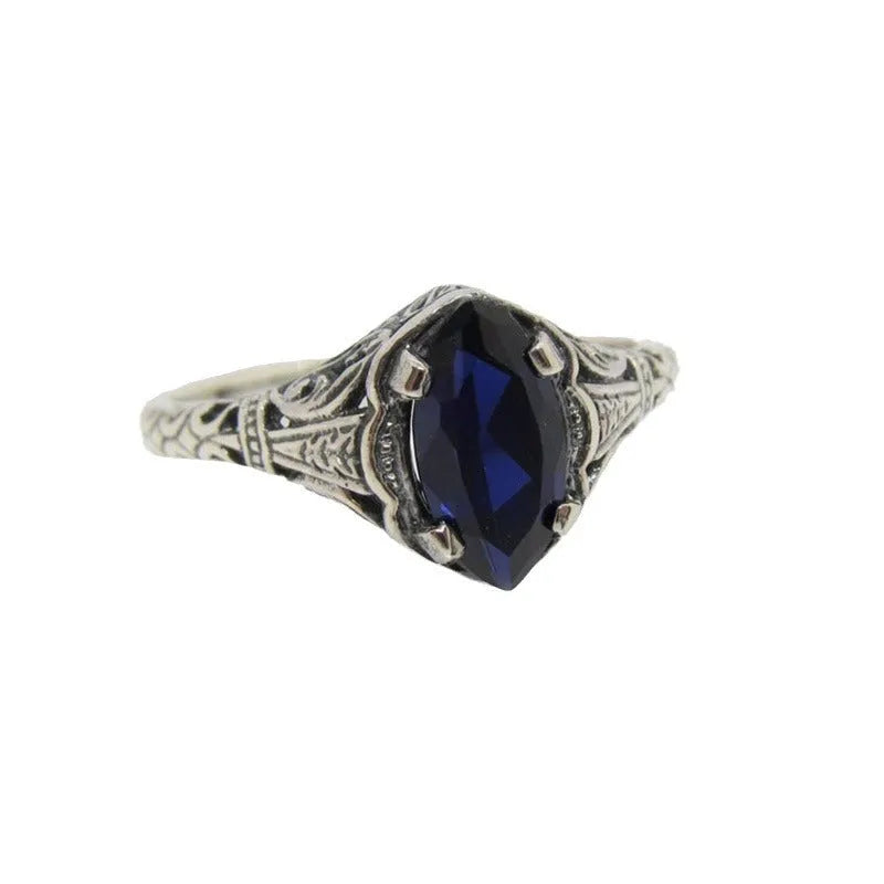 Silver women's geometric hollow ring with zircon accents on alloy band