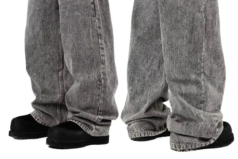Grey loose straight-leg cotton denim trousers with mid waist design on hanger