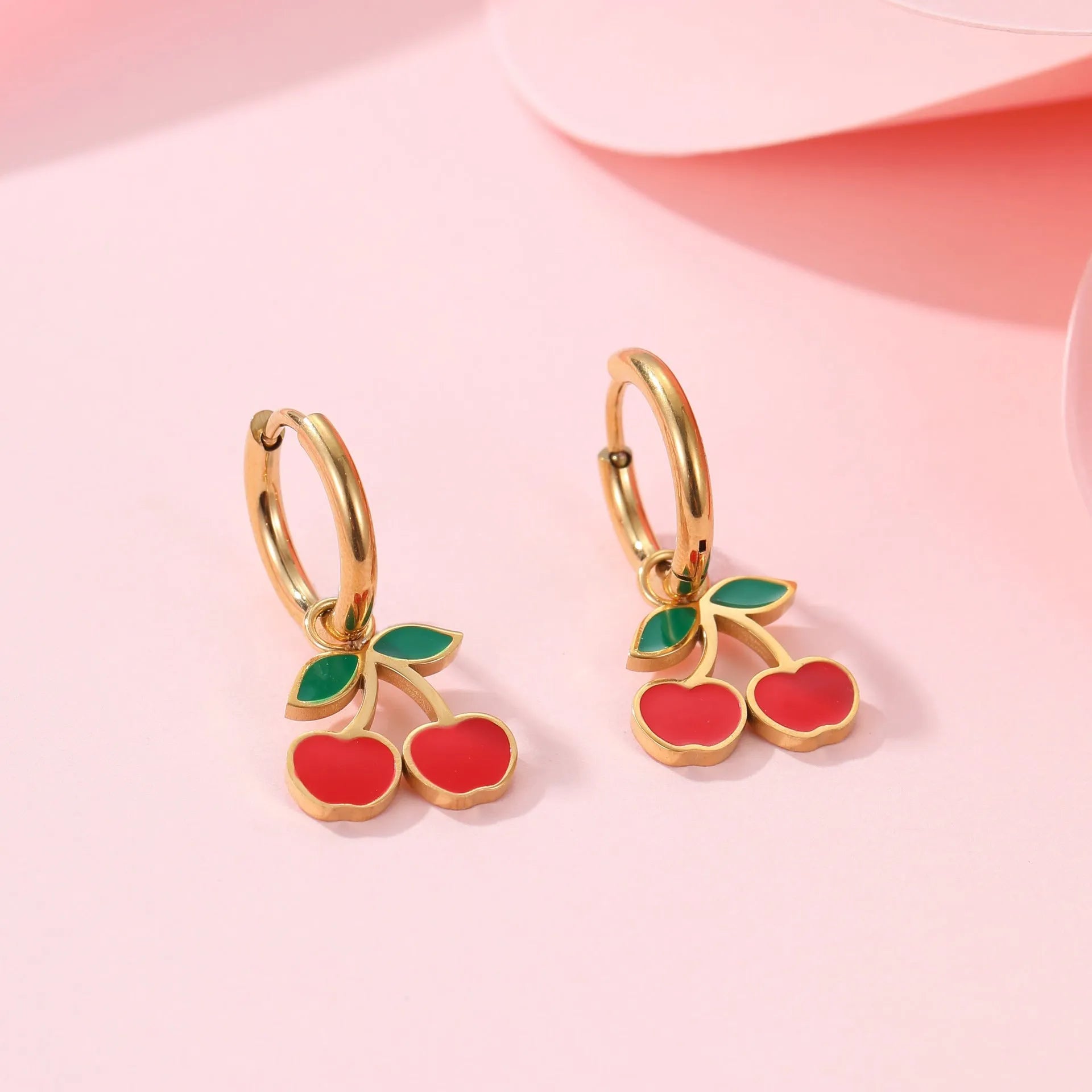 Cherry design stainless steel necklace, bracelet, earrings, and ring set with 18K electroplated finish.