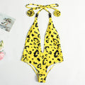 Women's red leopard print backless bandage one-piece swimsuit on a model.