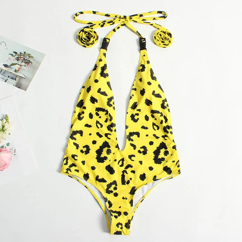 Women's red leopard print backless bandage one-piece swimsuit on a model.