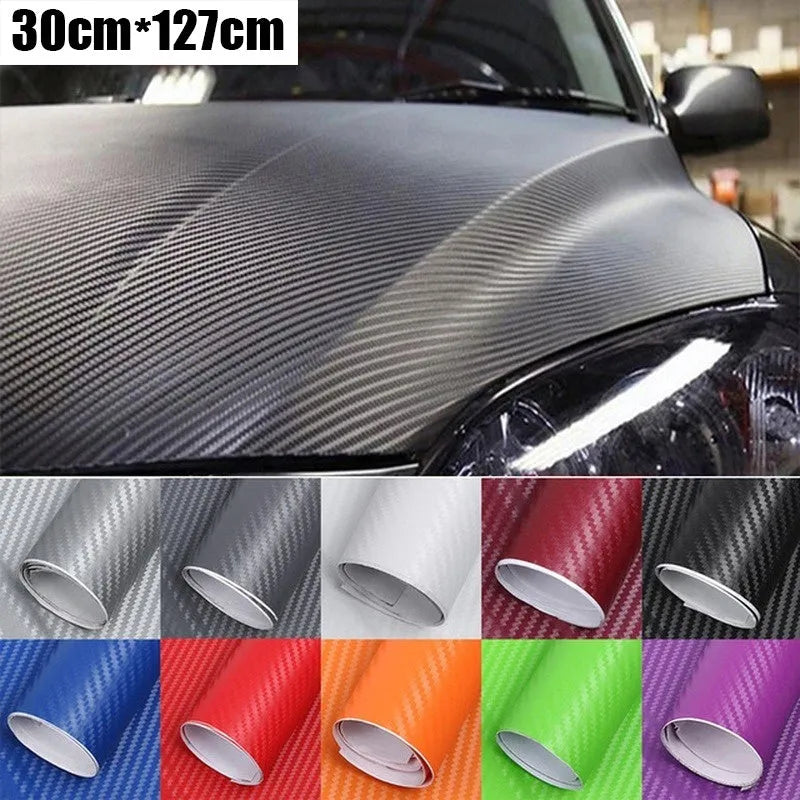 Roll of black 3D carbon fibre texture adhesive sticker for car decoration, showing textured pattern.