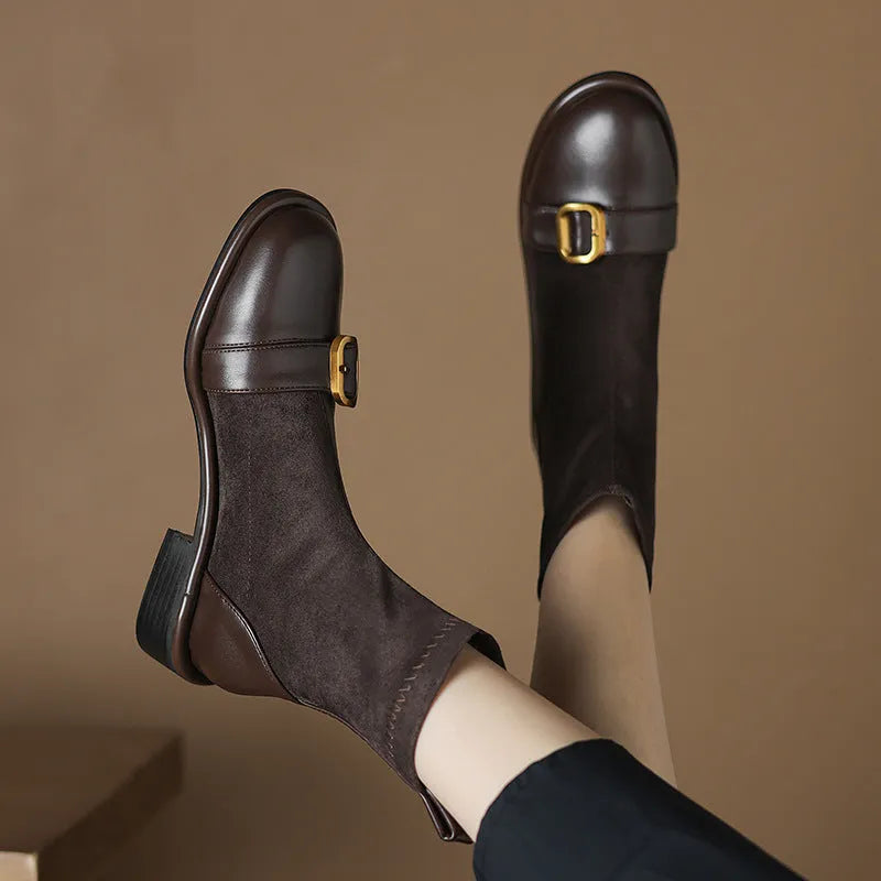 Women's black casual ankle boots with lace-up front and low rubber heel