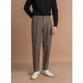 Men's straight-leg polyester trousers in black, shown in a business casual setting.