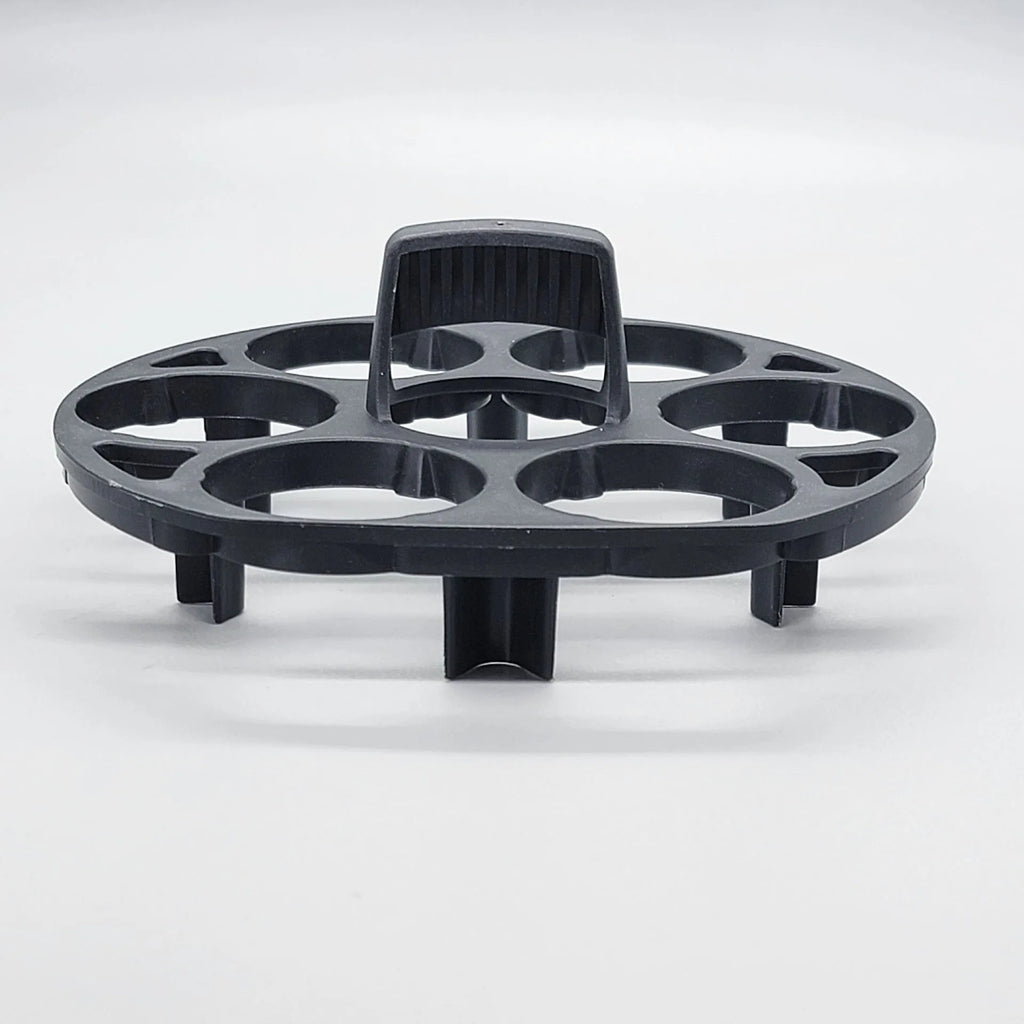 Black plastic egg holder basket measuring 13.8 by 12.6 by 5.7 centimetres