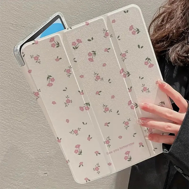 Transparent floral tri-fold tablet case for iPad showing magnetic closure and decorative pattern