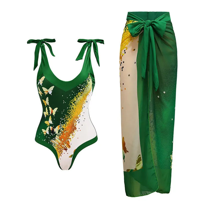 Women's solid colour one-piece swimsuit with spaghetti straps and an attached skirt.